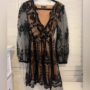 Black lace coattail dress.